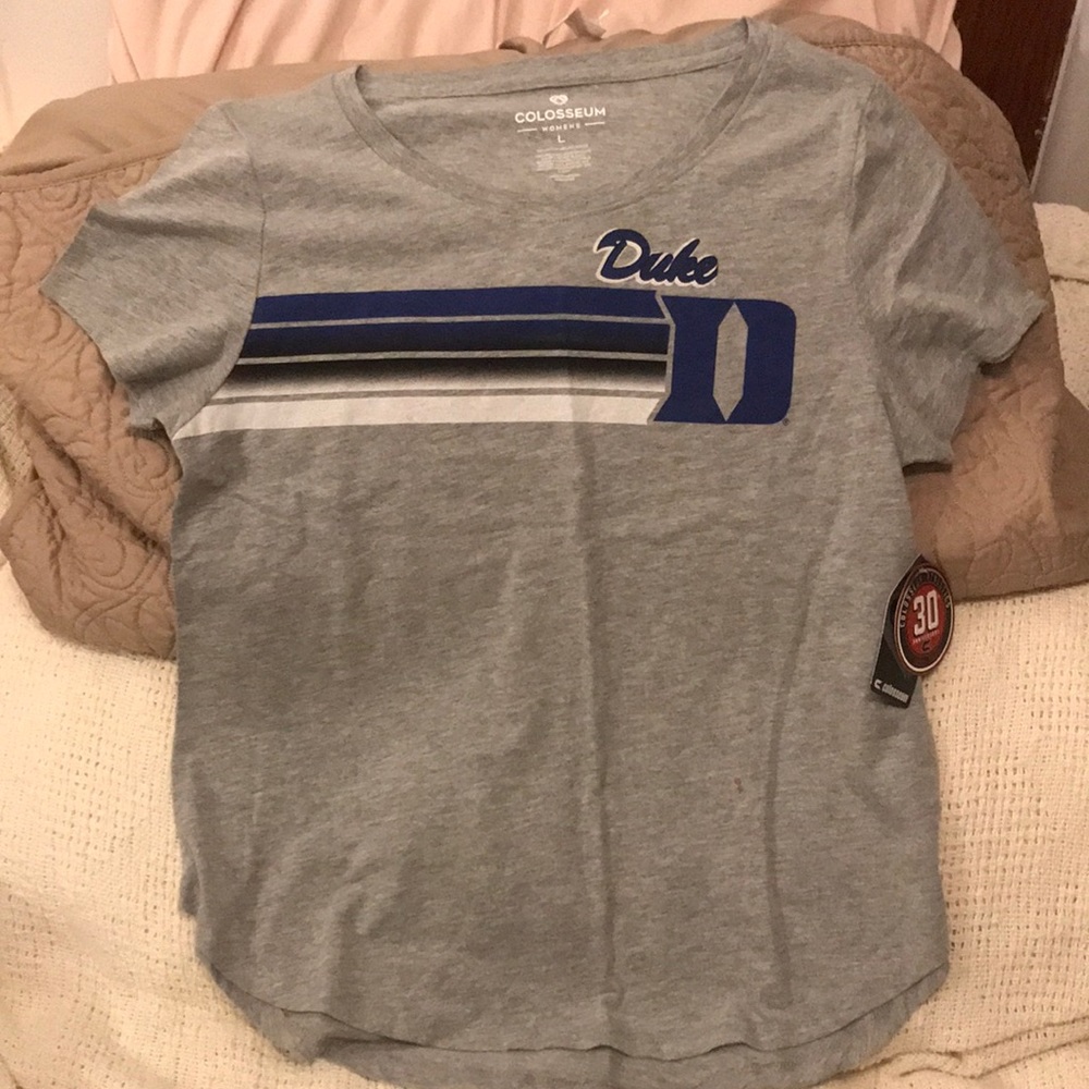 Woman’s Duke shortsleeved sport tshirt.new with tags.Color is gray.size is Large